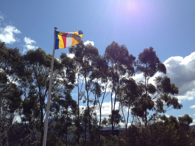 Buddhist flag flying at the Nan Tien Temple, Wollongong, Australia