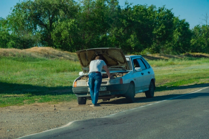 Man having car problems on the roadside