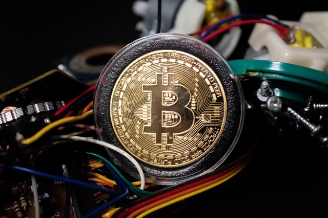 A bitcoin surrounding electric wires