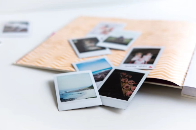 Photos on white wooden table