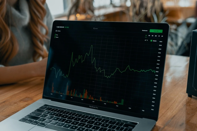 Stock market chart on laptop interface